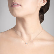 Annie James jewelry diamond and white gold necklace, butterfly charm, thyroid cancer awareness